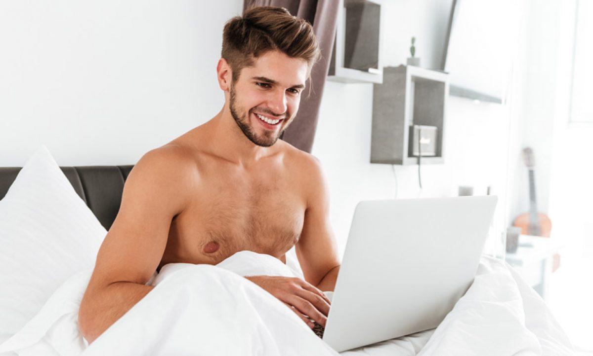 Man-Smiling-at-Laptop-Photo-by-Dean-Drobot-Shutterstock-1200x722